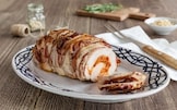 Rotolo di tacchino in crosta di pancetta