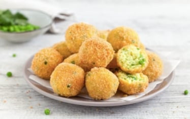 Polpette di riso allo zafferano e piselli