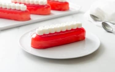 Éclair di panna cotta al mandarino e mousse alla vaniglia