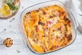 Parmigiana di zucca con pancetta affumicata e noci 