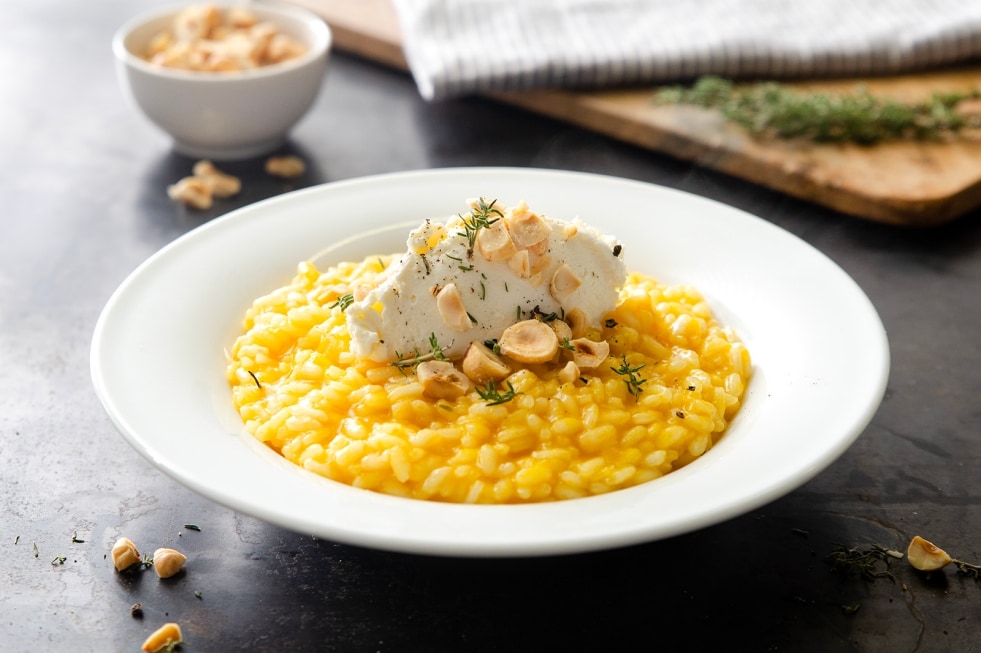 Risotto alla crema di zucca con mousse di parmigiano e nocciole  ricetta