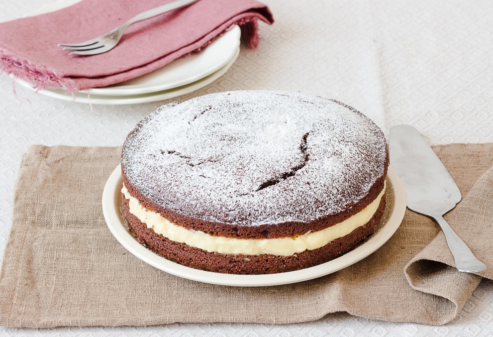 Torta al cacao, rum, crema all'arancia ricetta