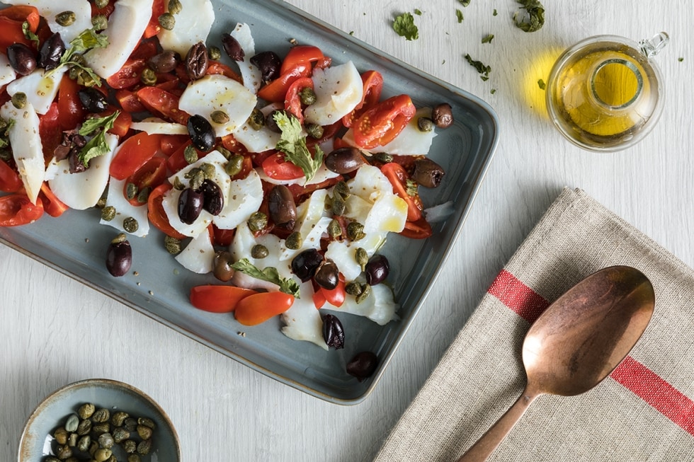 Baccalà con pomodorini, olive nere e capperi con cottura a bassa temperatura ricetta