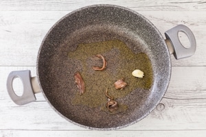 Preparazione Mafaldine al pesto di cime di rapa, stracciatella di burrata e acciughe - Fase 5