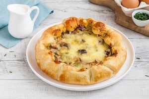 Preparazione Torta salata funghi, speck e mozzarella  - Fase 4