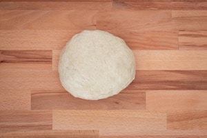 Preparazione Brioche knot salata alla ricotta, pomodori secchi e mandorle - Fase 3