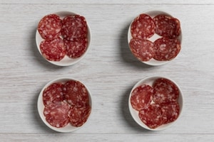 Preparazione Tartufini con fave, pecorino, noci e salame - Fase 2