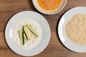 Preparazione Zucchine impanate al forno - Fase 1