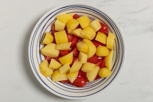 Preparazione Stoccafisso con patate, pomodorini e olive taggiasche  - Fase 2