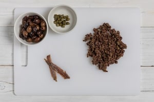 Preparazione Petali di baccalà con pomodorini confit e tapenade - Fase 2