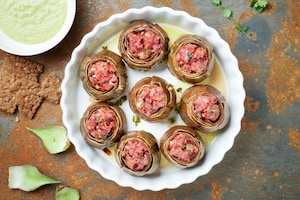Preparazione Carciofi ripieni di cotechino - Fase 6