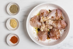 Preparazione Cosce di pollo speziate in friggitrice ad aria - Fase 1