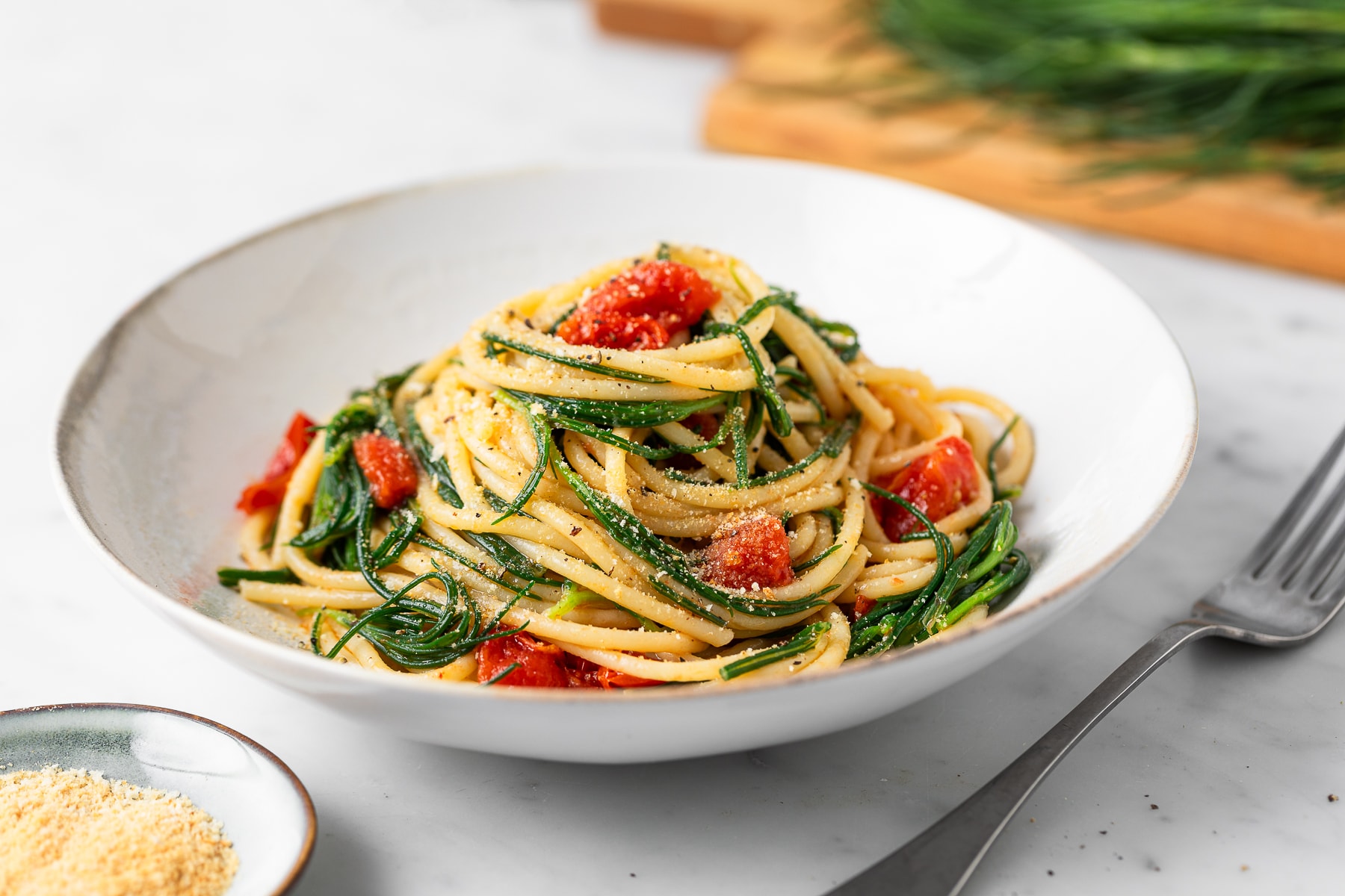 Pasta con agretti e pomodorini ricetta