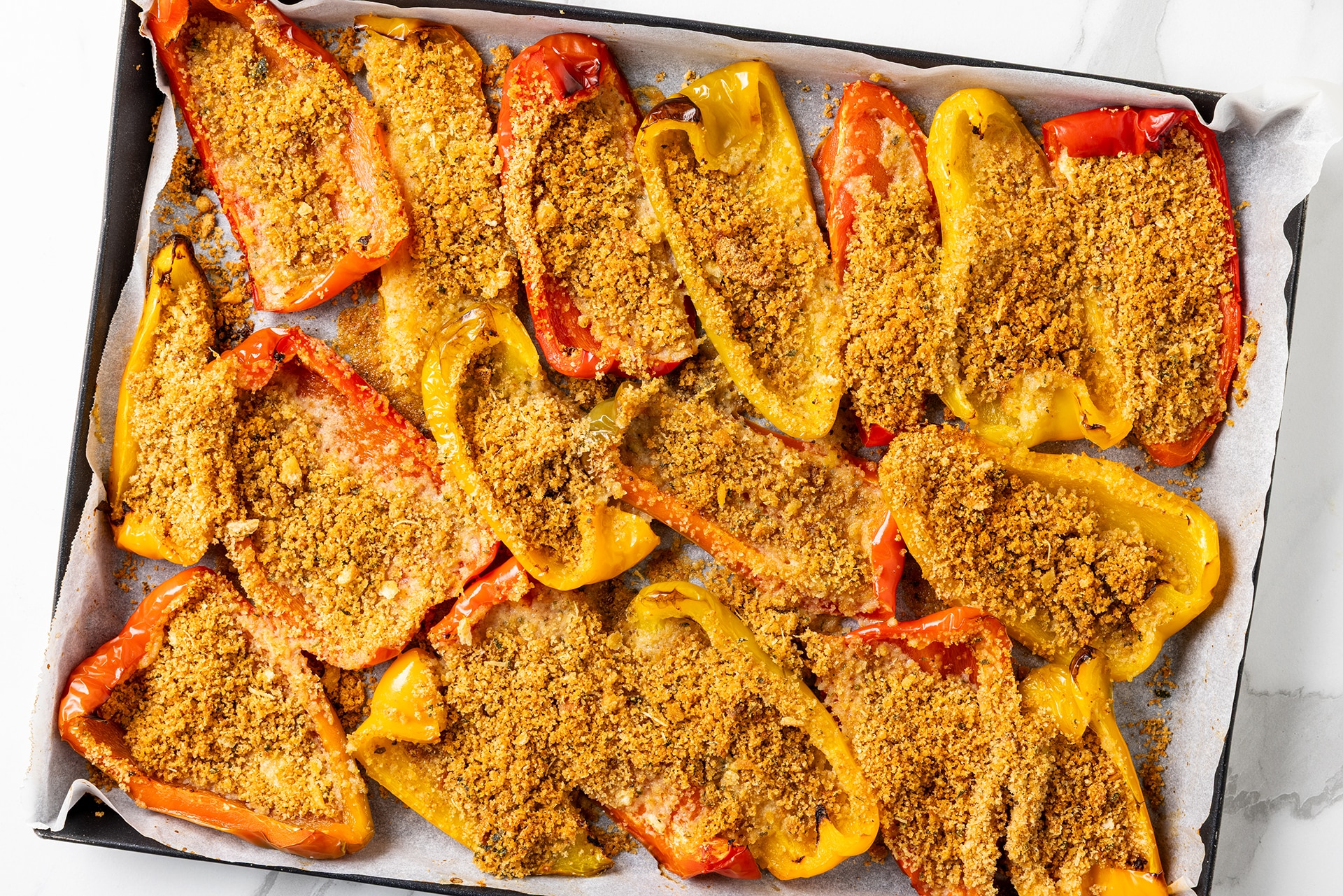Peperoni gratinati al forno ricetta